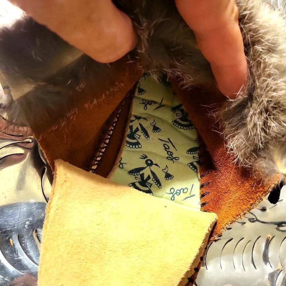 Moccasins,  real leather and real rabbit fur,  has a great insole! Size 8 child